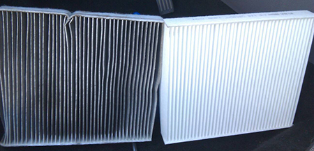 Comparing old cabin air filter to a new cabin air filter for cars